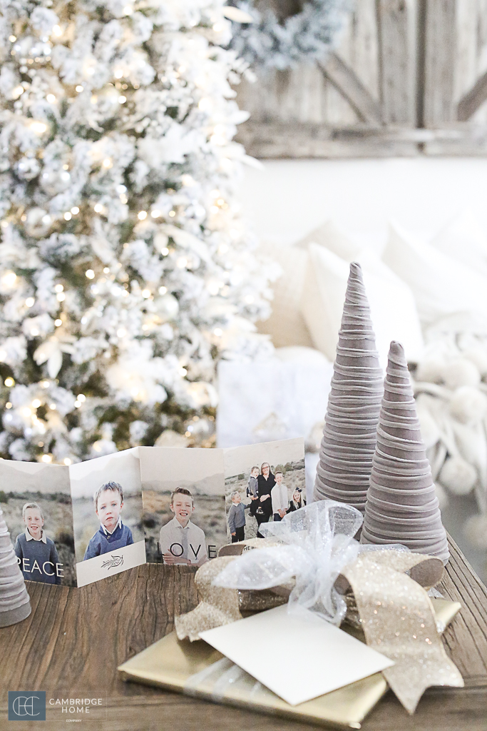 Gifts on table with Christmas Card